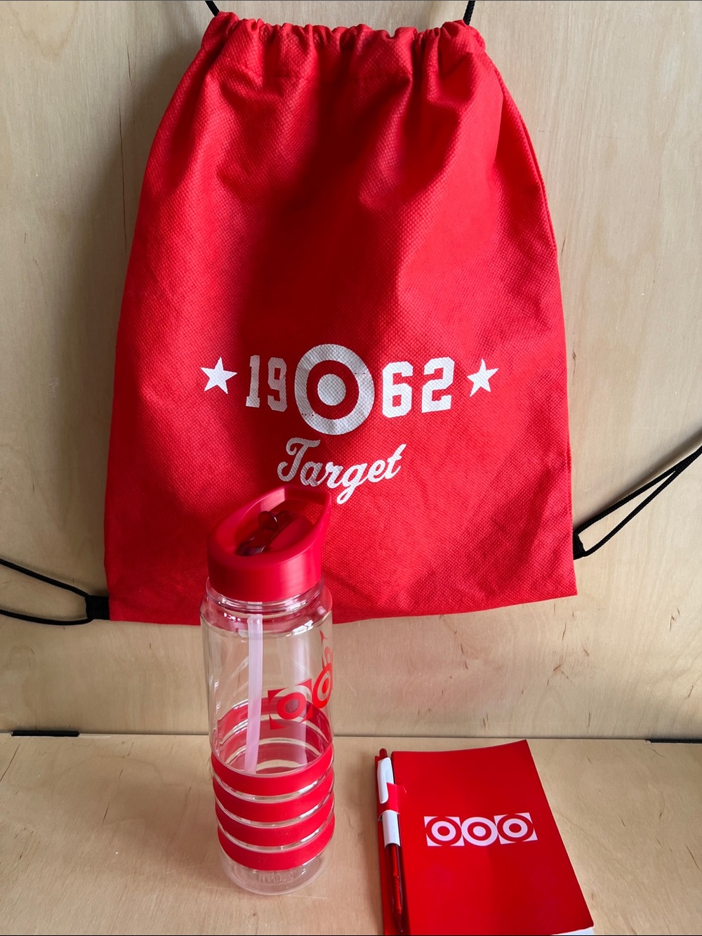 Target Red Drawstring Bag with Matching Red Water Bottle and Notebook